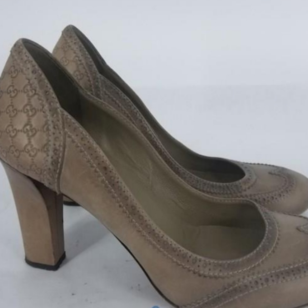 Gucci brown GG embossed leather heel pumps